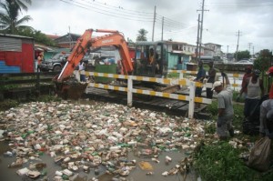 Workers cleaning a canal in the Sussex Street, Charlestown area