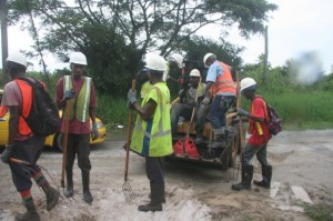 Workers in Albouystown, another area which is being cleaned