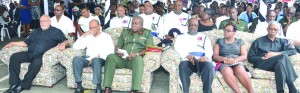 At left: President Donald Ramotar, Home Affairs Minister Clement Rohee, Guyana Defence Force Chief-of-Staff, Brigadier Mark Phillips, Police Commissioner Leroy Brumell and Opposition Leader David Granger (right) were among those who attended the funeral of the late Derrick Josiah 