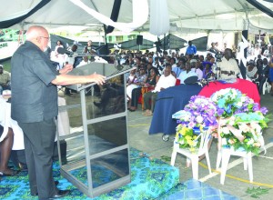 President Donald Ramotar addressing the huge gathering at the funeral service of the late Derrick Josiah at the Uitvlugt Community Centre Ground  