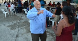 Showing his moves, President Donald Ramotar cuts the barriers at the party hosted by the Rice Producers Association