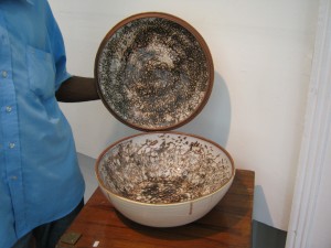 A beautifully glazed ceramic bowl with cover