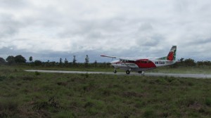 Aircraft taking off from Annai airstrip