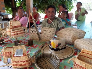 Artist Theodore Edward, winner of the KMCRG Award, showcasing his crafts