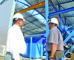 Prime Minister Samuel Hinds and GPL’s CEO Bharat Dindyal inspecting works ongoing at the power station