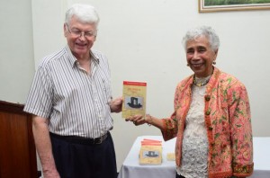 Dr Ian McDonald presenting a volume of the Kyk-Over-Al series to A J Seymour’s niece, Dr Jacqueline de Weever on behalf of Culture Minister,  Dr Frank Anthony and Caribbean Press editor, Professor David Dabydeen
