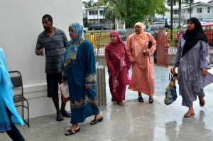 Women proceed into the masjid