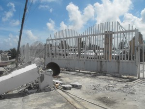 The fence at the BM Soat branch at Success, East Coast Demerara that was erected after the Public Works Ministry demolished the one on the government’s reserve