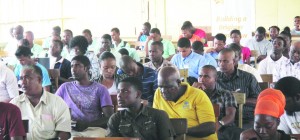 Students listen attentively to Romol Bereaux’ construction technology presentation 