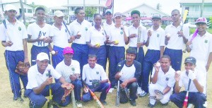 During 2013 the Guyana Baseball League (GBL) was able to expand the game beyond Georgetown. Here, students of the Berbice High School strike a pose after a session conducted by the GBL