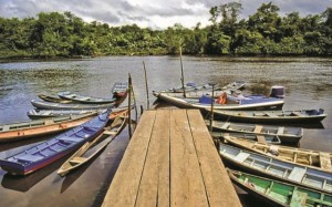 The most common interior mode of travel. Boats surround a landing on the Pomeroon River