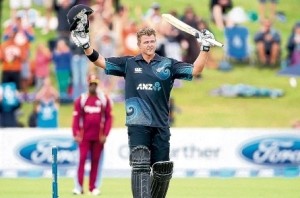 New Zealand batsman Corey Anderson celebrates his century against the West Indies in the third One-Day International at the Queenstown Events Centre yesterday. (PHOTO: WICB) 