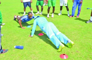 Vishal Singh and Trevon Griffith doing their rounds of push-ups