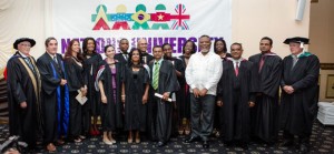 Prime Minister Samuel Hinds with the first group of graduates of the AIB MBA programme