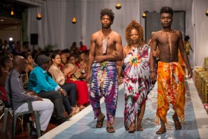 Tracy (center) on the catwalk with models showcasing her designs