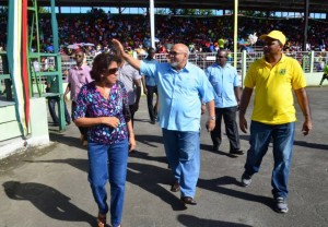 President Donald Ramotar and First Lady Deolatchmee Ramotar entering the National Park in Georgetown to view the costume and float parade on Mash Day (February 23). Also in picture is Minister of Culture, Youth and Sport, Dr. Frank Anthony