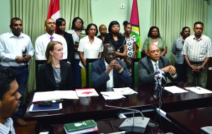 From left seated: Canadian High Commissioner to Canada, Dr Nicole Giles; Clerk of the National Assembly Sherlock Isaacs; and Speaker of the House Raphael Trotman with staff of the Parliament Office at the signing of the agreement on Friday 