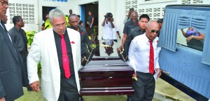 Rose’s casket being removed from the church by close relatives 