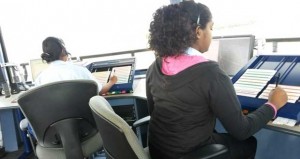 From left: Mrs. Francesca Wilson and Ms. Jennita Bhagwandin at the control position in the Timehri Control Tower.