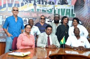 Seated: Guyana Festival Coordinator Tameca Sukhdeo Singh; Acting Tourism, Industry and Commerce Minister Irfaan Ali; and Night of Legends Chairman Lennox Canterbury, surrounded by some of the artistes who will be performing at the Night of Legends Concert