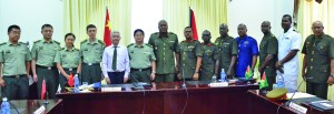 Chief-of-Staff Brigadier Mark Phillips and Major General Kong Li with senior officers at the Guyana International Conference Centre, Liliendaal