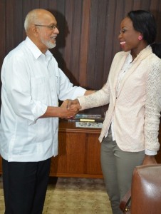 President Donald Ramotar greeting Lisa Punch on Wednesday.  (GINA photo)