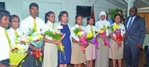 Education Minister Priya Manickchand, Chief Education Officer, Olato Sam and some of the 2014 top students