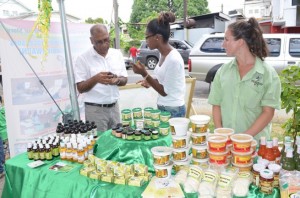 Agriculture Minister, Dr Leslie Ramsammy inspecting local agro processed products 