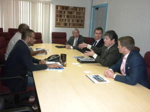 Natural Resources and Environment Minister Robert Persaud and acting Commissioner of the Guyana Geology and Mines Commission Newell Dennison meeting with the team from HESS Corporation