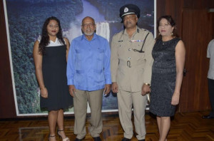 Top Cop Seelall Persaud along with his wife and daughter with President Donald Ramotar moments after being sworn-in