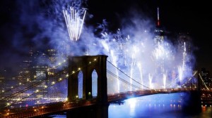 Fireworks light up the sky above the Brooklyn Bridge during Macy's Fourth of July fireworks show, Friday, July 4, 2014, in New York