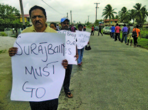 The protest headed by former Minister within the Agriculture Ministry and PPP/C representative Alli Baksh in front of GECOM Office at Bush Lot in Region Two