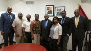 Guyana's Consul General to New York Brentnold Evans with initial planning committee members