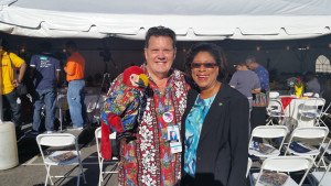 Tourism Minister Cathy Hughes with “Bob” the parrot and TV Weatherman Joey Stevens