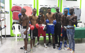 Seven of the eight boxers to appear on the professional segment of the card at the Giftland Mall on Tuesday afternoon (Avenash Ramzan photo) 