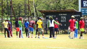 Head coach, Esaun Crandon making a point during Monday’s fielding session