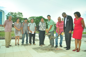 Toshaos Lennox Shuman and John Derrick turn the sod in the presence of Ministers Cathy Hughes, David Patterson and Dr Rupert Roopnaraine