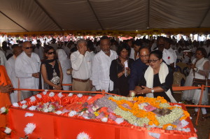 Guyanese from all walks of life on Wednesday turned up at the Cove and John Ashram, East Coast Demerara to pay their last respects to a renowned spiritual leader, Swami Vidyanandaji during a moving, emotional funeral service and cremation exercise. In the photo from the left are former President Donald Ramotar and Mrs Deolatchmee Ramotar, Education, Culture and Youth Minister, Dr Rupert Roopnaraine, former Prime Minister Samuel Hinds, Prime Minister Moses Nagamootoo and his wife Seeta Nagamooto  and others (Carl Croker photo)