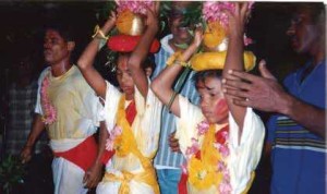 Carrying karakam (water pots) to praise the rain goddess