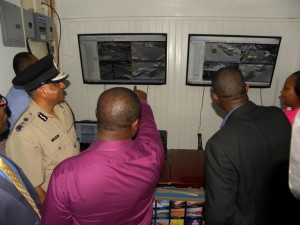 A police officer demonstrates the police’s live feed of Georgetown 