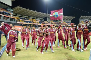 West Indies cricketers celebrate after victory in the ICC Twenty Cricket World Cup's final match between Sri Lanka and West Indies at the R. Premadasa International Cricket Stadium in Colombo on October 7, 2012. AFP PHOTO/ LAKRUWAN WANNIARACHCHI