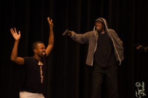 The actor (right) doing what he loves - performing on stage