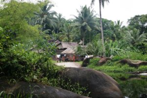 Living among boulders. Children play between boulders, which are found throughout the village (Photo by Annette Arjoon-Martins)