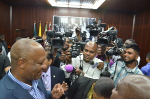 Minister of State, Joseph Harmon cornered by the media 