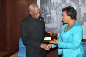 President David Granger presents a token to Secretary-General of the Commonwealth of Nations, Baroness Patricia Scotland, during a courtesy call, on Wednesday morning, at the Ministry of the Presidency.