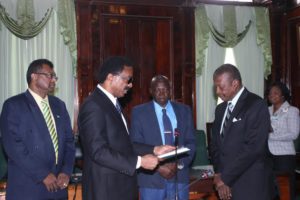 Attorney General Basil Williams, in the company of Public Security Minister Khemraj Ramjattan, handed over the Rodney CoI Report to House Speaker, Dr Barton Scotland 