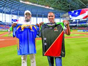 Steven Taylor of the Barbados Tridents and Samuel Badree of the St Kitts and Nevis Patriots at a baseball arena in the USA