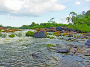 Water cascades through boulders (Photo by Peggy Rehm on Flickr)