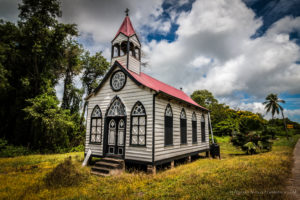 Vivid colours and contrasts stand out in this photo of a rustic church building