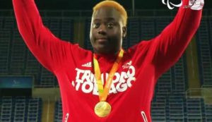 Akeem Stewart celebrates his gold medal at the Rio Paralympics